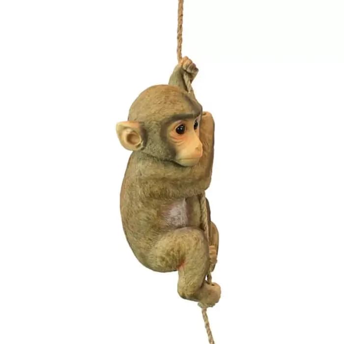 Figurine de singe grimpant de jardin