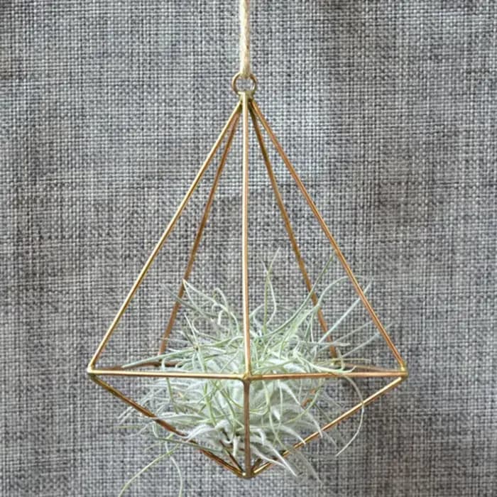 Pot mural géométrique en macramé
