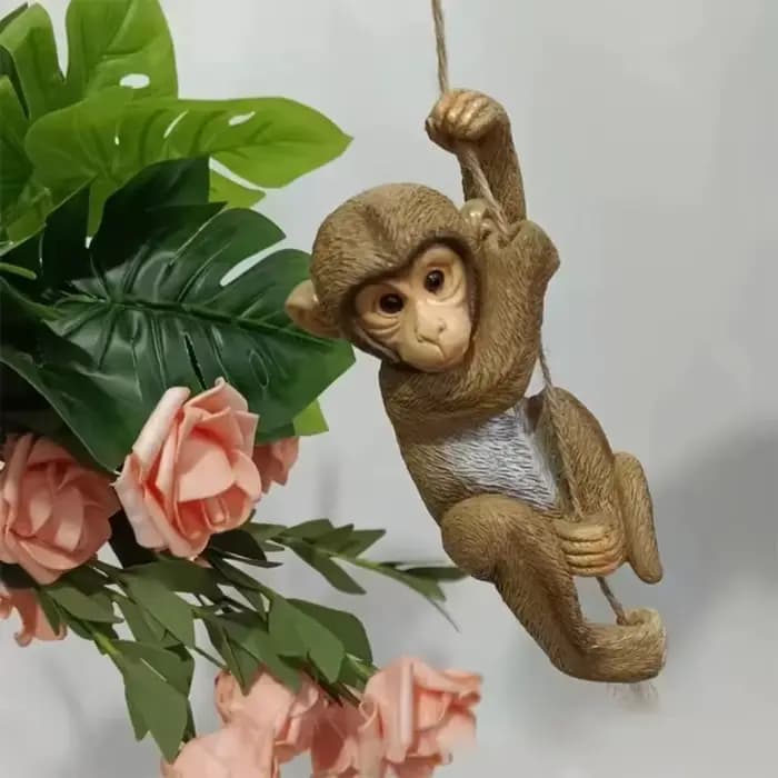 Figurine de singe grimpant de jardin
