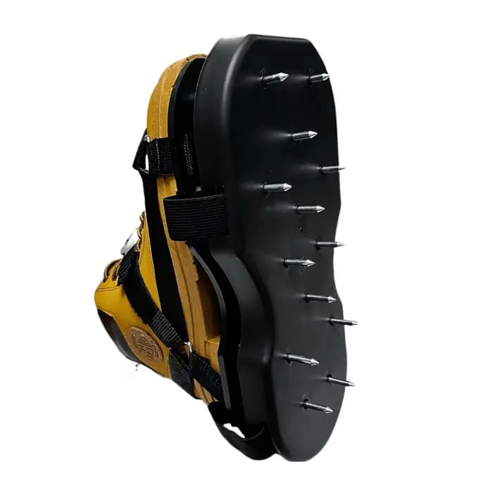 Chaussures d'aérateur de pelouse pour couche d'herbe avec Base à ressort inférieure à pointes