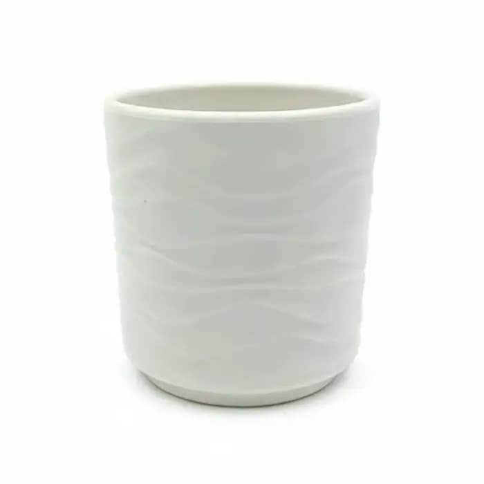Les pots de fleurs simples en forme de vague