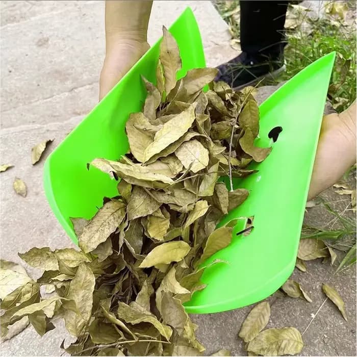Râteau en plastique horticole pour ramasser les feuilles mortes dans les jardins