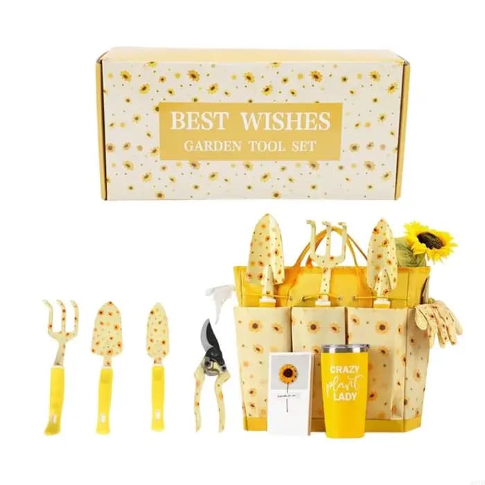 Dernier coffret cadeau jardinage mettant en valeur belle finition du plan floral avec des appareils fondamentaux