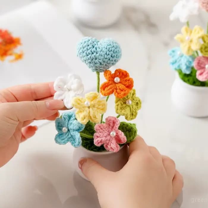 Petites plantes en pot au crochet faites à la main