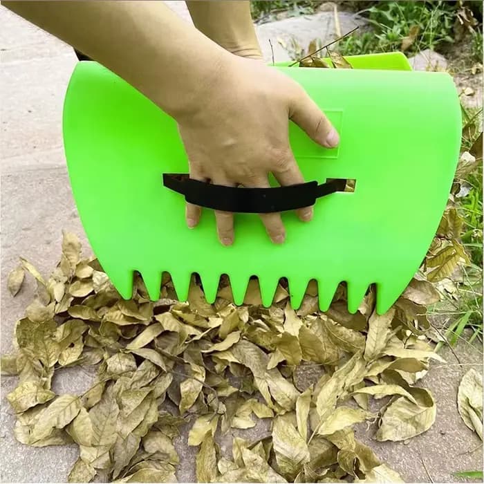 Râteau en plastique horticole pour ramasser les feuilles mortes dans les jardins