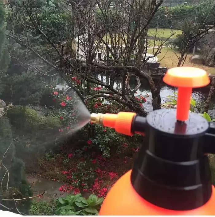 Arrosoir épais domestique pour l'arrosage des fleurs