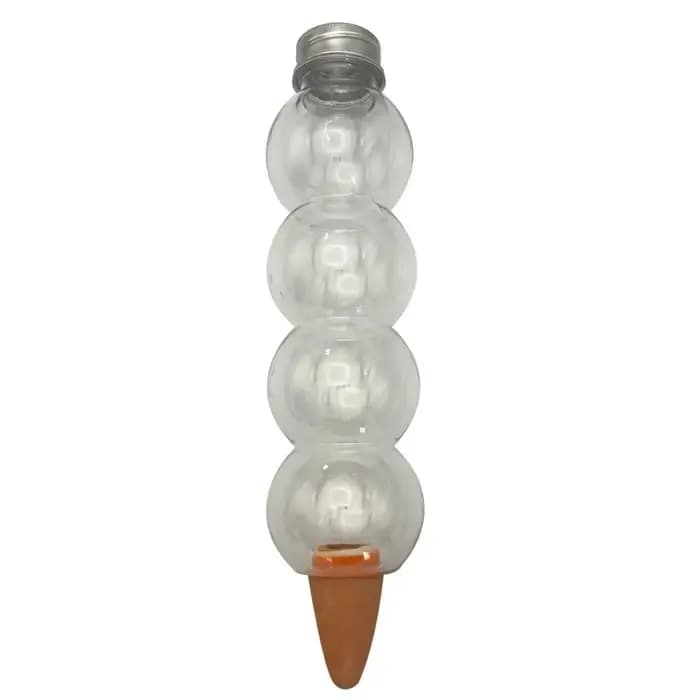 Dispositif d'arrosage automatique transparent en forme de gourde allongée