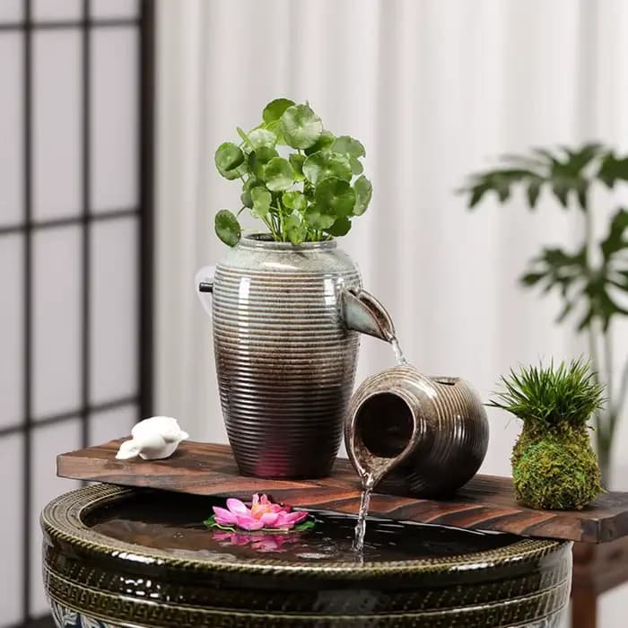 Pot à fleurs en argile à ouverture supérieure avec circulation d'eau