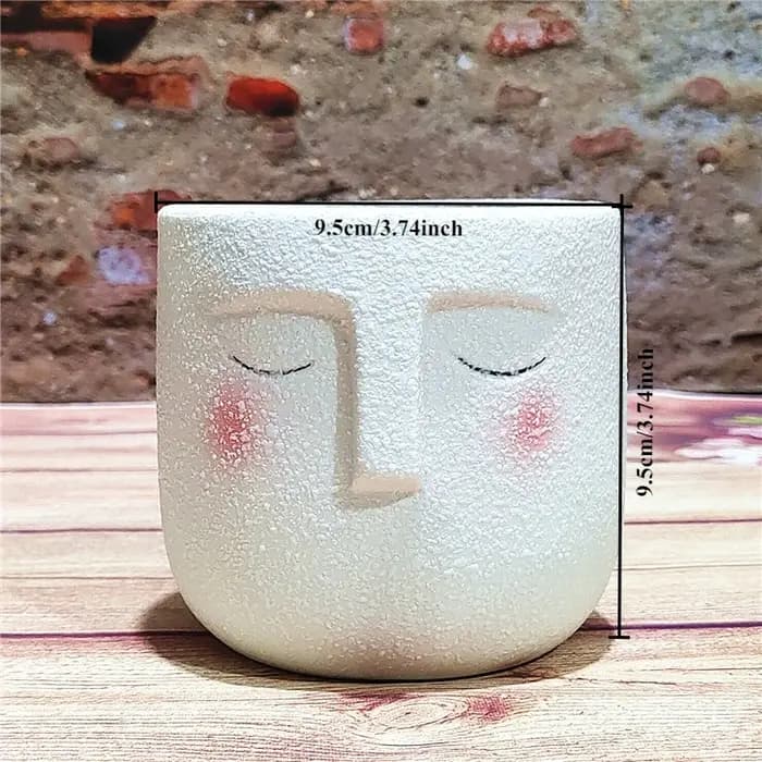 Pot de fleurs en céramique en forme de visage de dessin animé
