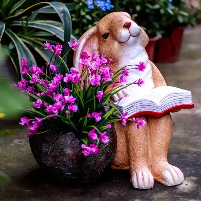 Pot de fleur lapin de lecture