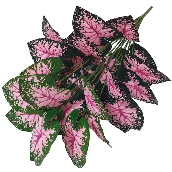 Plantes artificielles en pot de feuilles roses