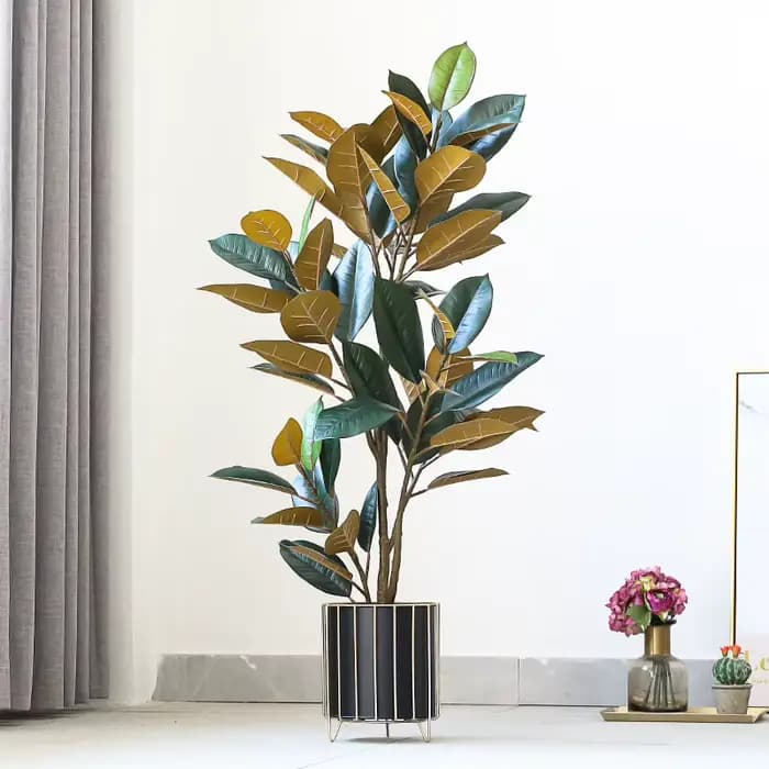 Plantes artificielles décoratives et arbres en Pots
