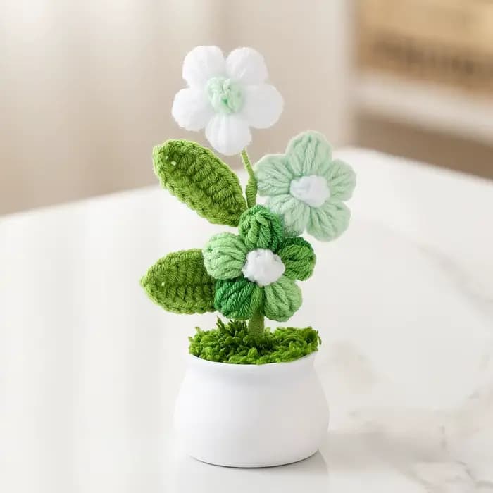 Petites plantes en pot au crochet faites à la main