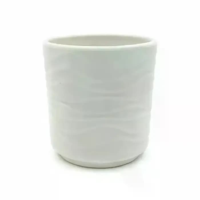 Des pots de fleurs simples en forme de vague
